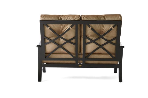 Back view of the Anthem Love Seat with a black metal frame featuring X-shaped designs. It has light brown, tufted seat cushions and is set against a plain white background.