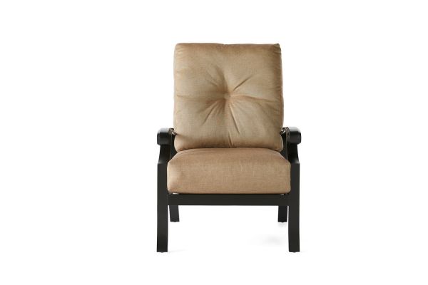 The Anthem Lounge Chair, featuring a tufted beige cushion, black metal frame, and armrests, is shown from the front against a white background.