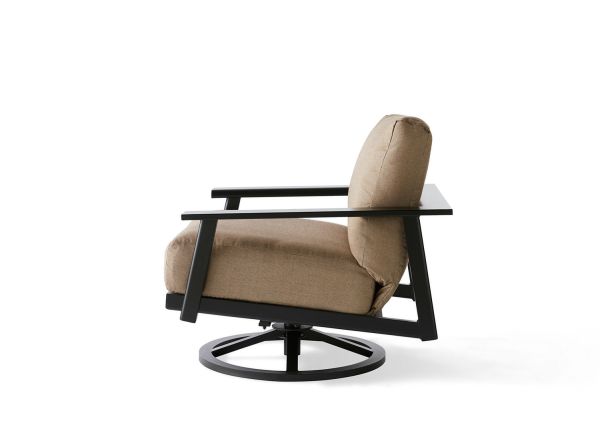 Side view of the Dakoda Cushion Swivel Rocking Lounge Chair in beige, featuring a modern design with straight armrests and a round black metal base, set against a white background.