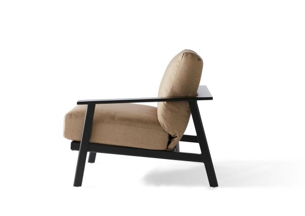 Side view of the Dakoda Cushion RAF Sectional End Unit, featuring a beige cushioned seat and backrest on a sleek black wooden frame. The minimalist design emphasizes clean lines and a contemporary style.