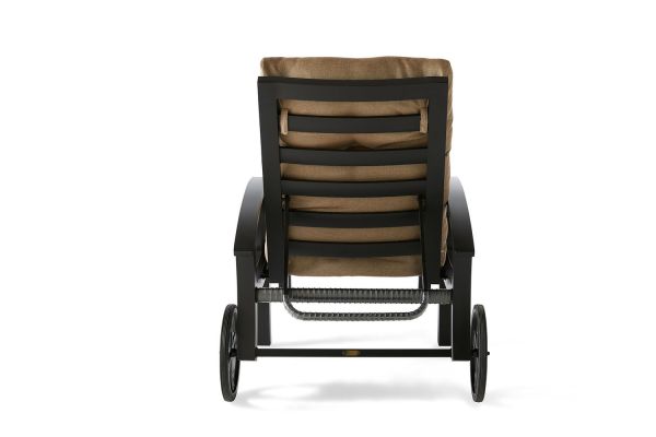 Rear view of the Eclipse Chaise Lounge with a dark metal frame and brown cushion, featuring curved armrests and two wheels for easy mobility, set against a white background.