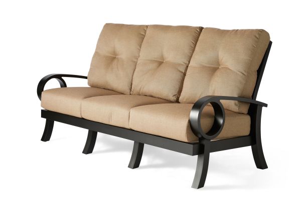 The Eclipse Sofa is a modern, stylish three-seater with a black metal frame and curved armrests. It features beige cushions with tufted seat and backrests for added texture.