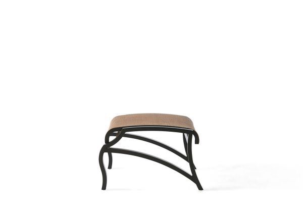 The Volare Sling Ottoman showcases a contemporary stool design with a light brown woven seat and sleek black curved metal legs, set against a simple white backdrop.