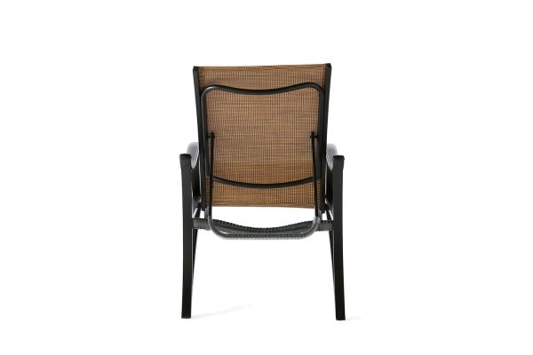 Rear view of the Volare Sling Adjustable Chaise Lounge featuring a tan wicker backrest and black metal frame. It has curved armrests, a sturdy design, and a classic woven pattern on the backrest that complements its modern style.