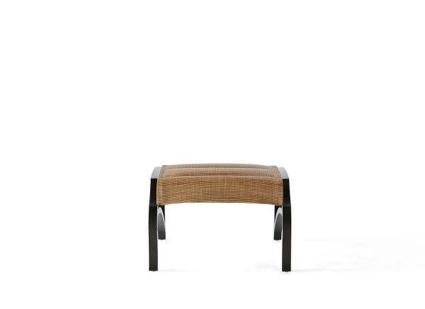 A small, modern Volare Padded Sling Ottoman features a woven brown seat with sleek black metal legs against a white background.