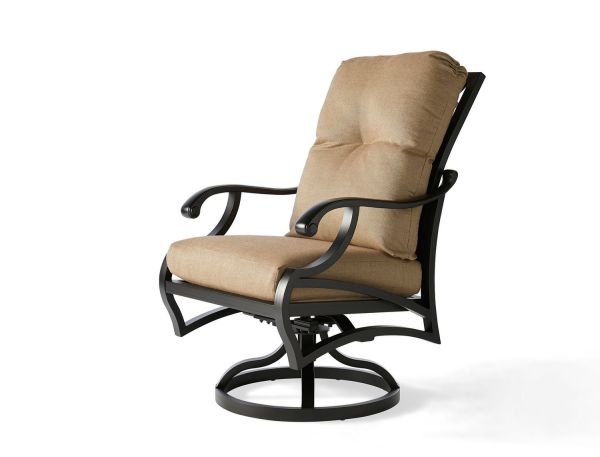 The Volare Cushion Swivel Rocking Dining Armchair features a black metal frame, beige cushioning, curved armrests, and a swivel base, offering an elegant design ideal for outdoor use.