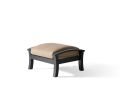 The Eclipse Ottoman is a small, black wooden footstool featuring a brown cushioned top, displayed against a plain white background.