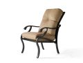 Back view of the Volare Cushion Dining Armchair showcasing a decorative curved pattern on its backrest, made with a black metal frame and featuring a brown cushioned seat.