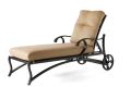 Front view of the Volare Cushion Adjustable Chaise Lounge featuring a cushioned metal frame and armrests. It boasts beige upholstery with a high backrest, blending modern design with comfort.